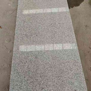 湖州芝麻白光面毛板