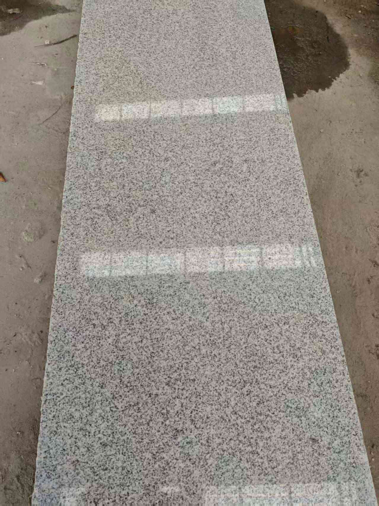 湖州芝麻白光面毛板